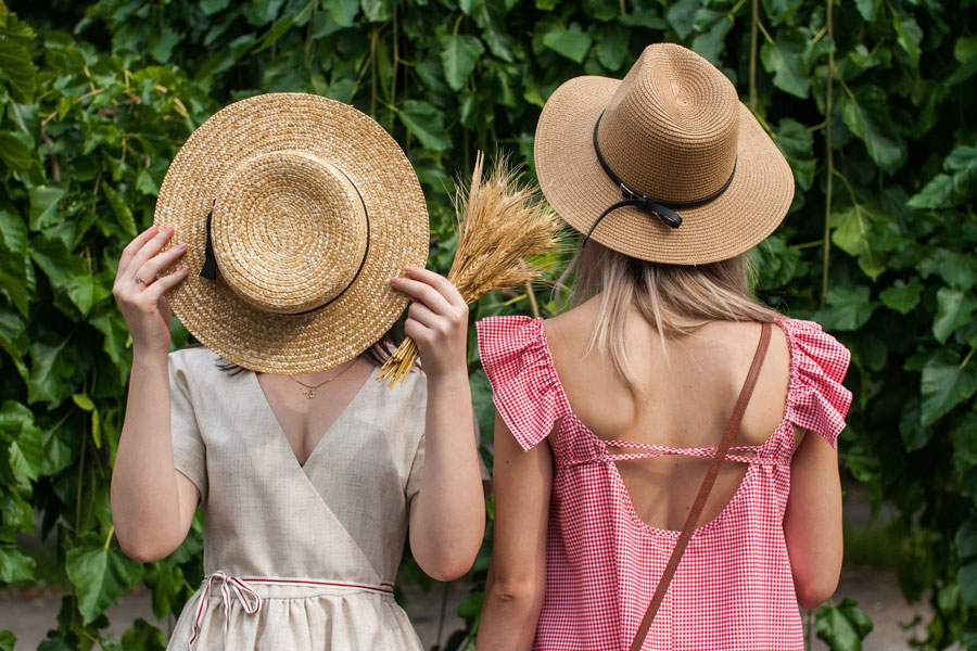 Image of two women in beige color summer hats depicting best women's summer hats for this summer season