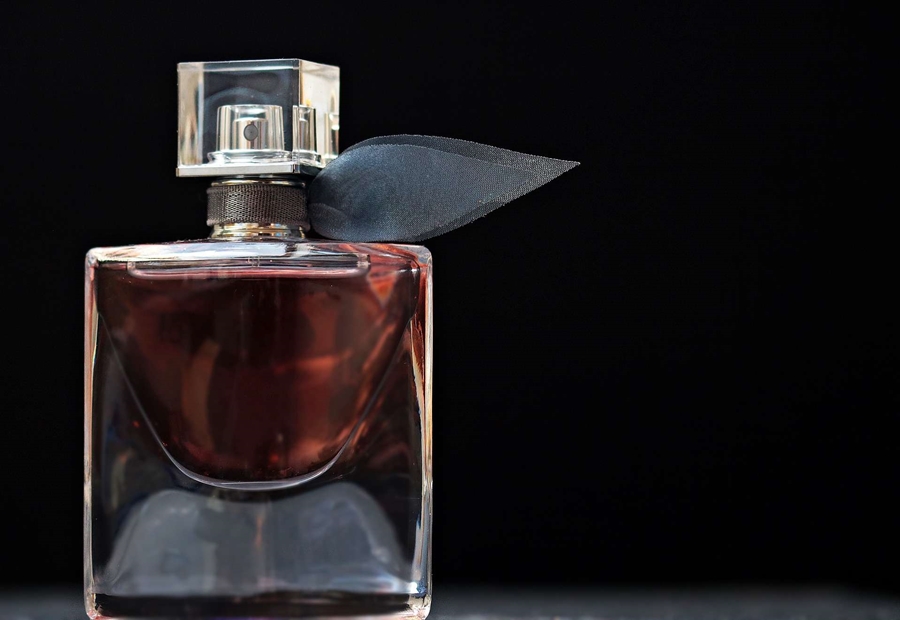 Perfume in a flacon glass bottle