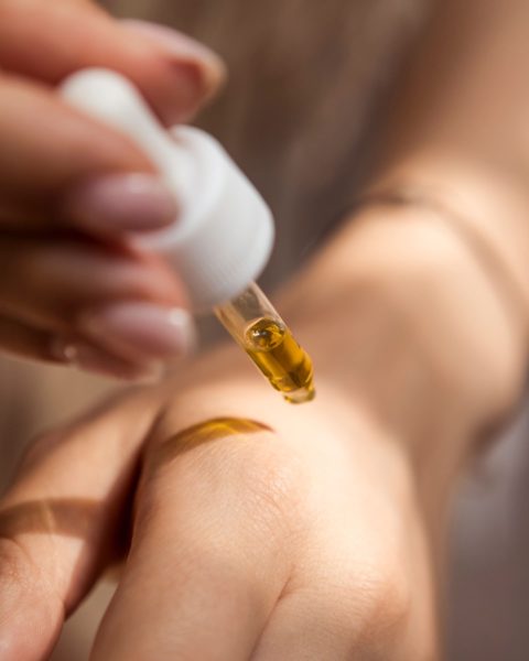 Image of a hemp seed oil in a dropper
