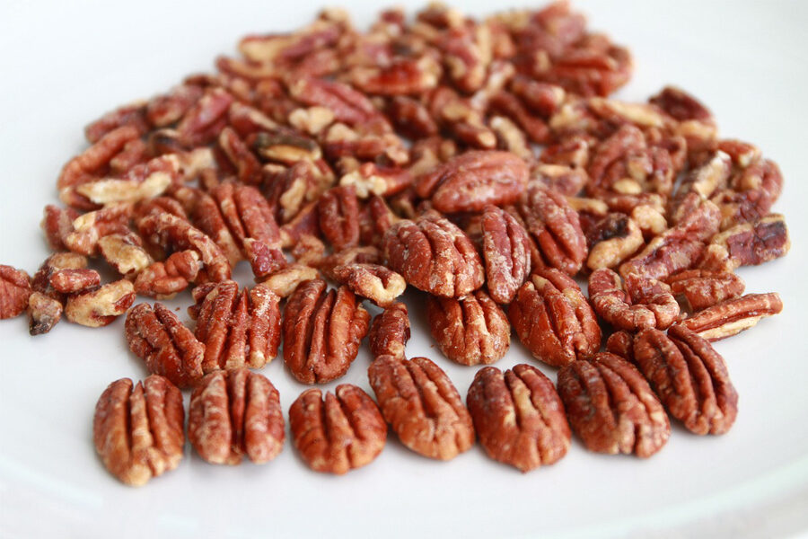 Image of toasted pecans depicting benefits of pecans