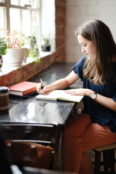 Image of a girl engaging in journaling
