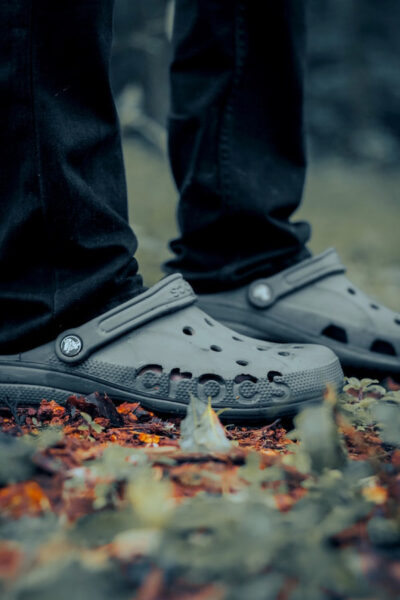 An image of a man wearing a pair of Crocs for men depicting it's fashionable nature