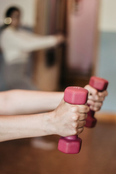 Image of a person using dumbbells